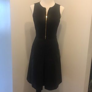 Michael Kors size 6 black dress, sleeveless, gold zippers, pockets, fully lined